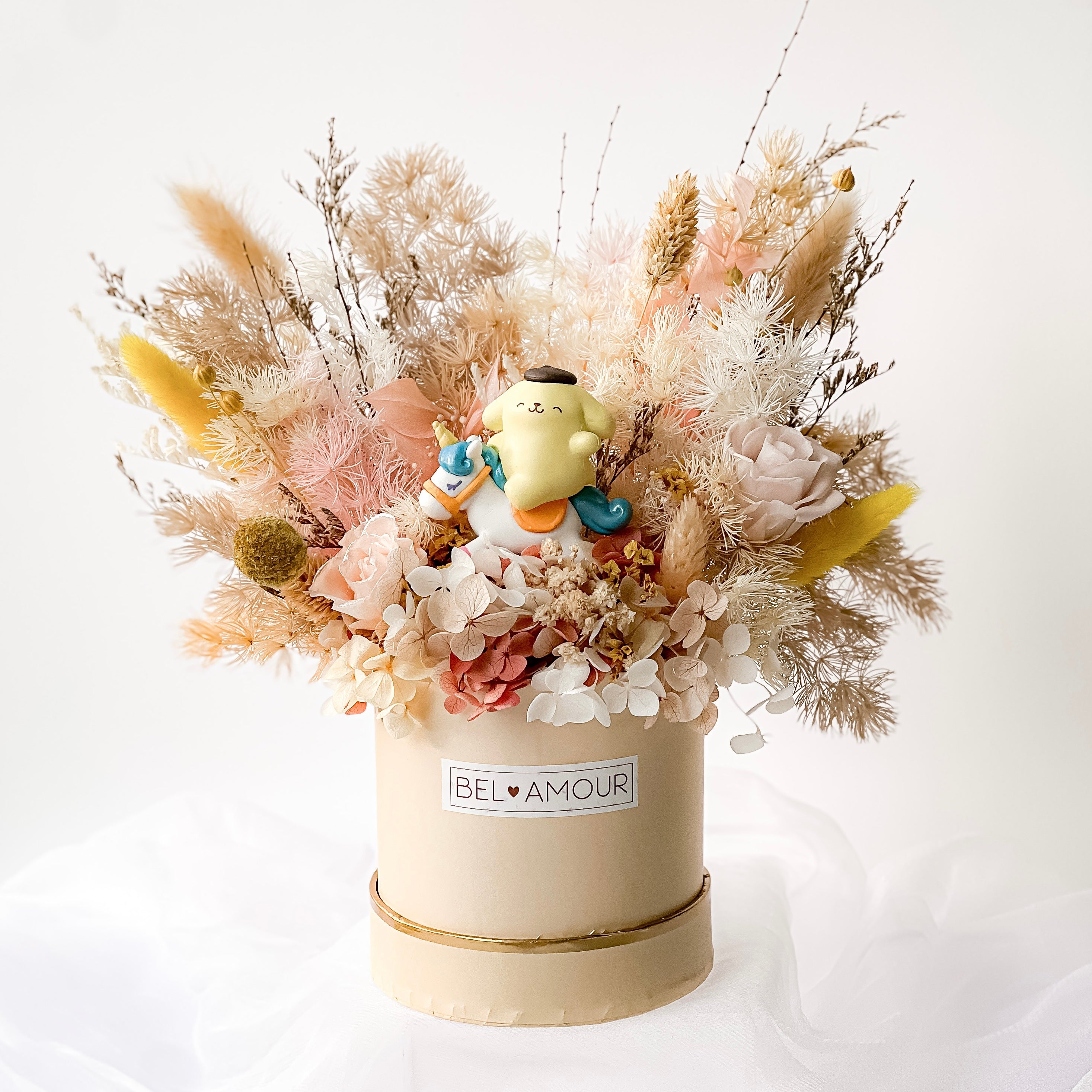 Sanrio Pompompurin Figurine with Preserved Flower Bloom Box.